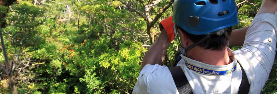 A man prepares for the first of 15 cables in Monteverde's longest canopy tour with Extremos on April 17, 2013.