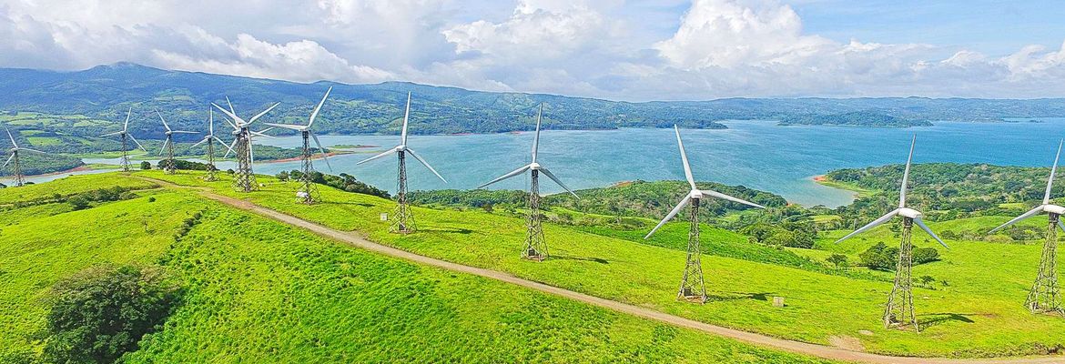 wind mills on the hilltops of lake arenal