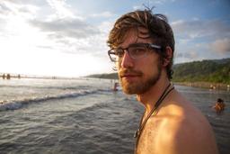 man looking at the ocean envision festival