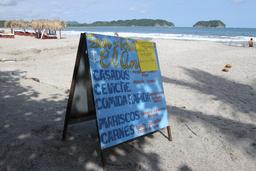 el ancla sign on beach 5