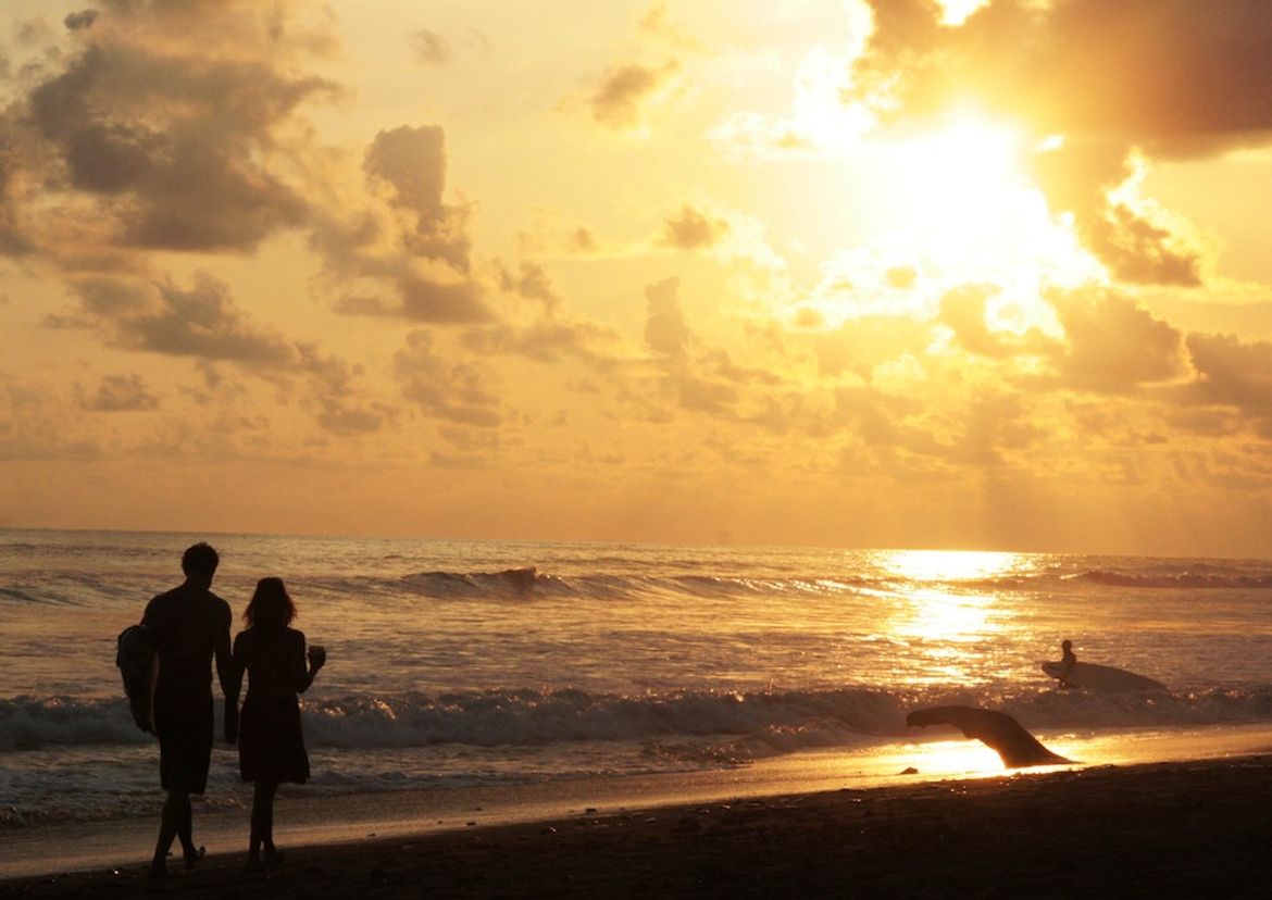 Couple Enjoying a Dominical Sunset
