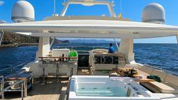 yacht sundeck with jacuzzi bar and speakers