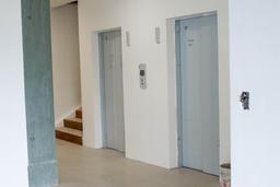 two elevators manufactured by otis company