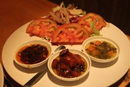 salad with dips for tenderloin at casa del mar restaurant
