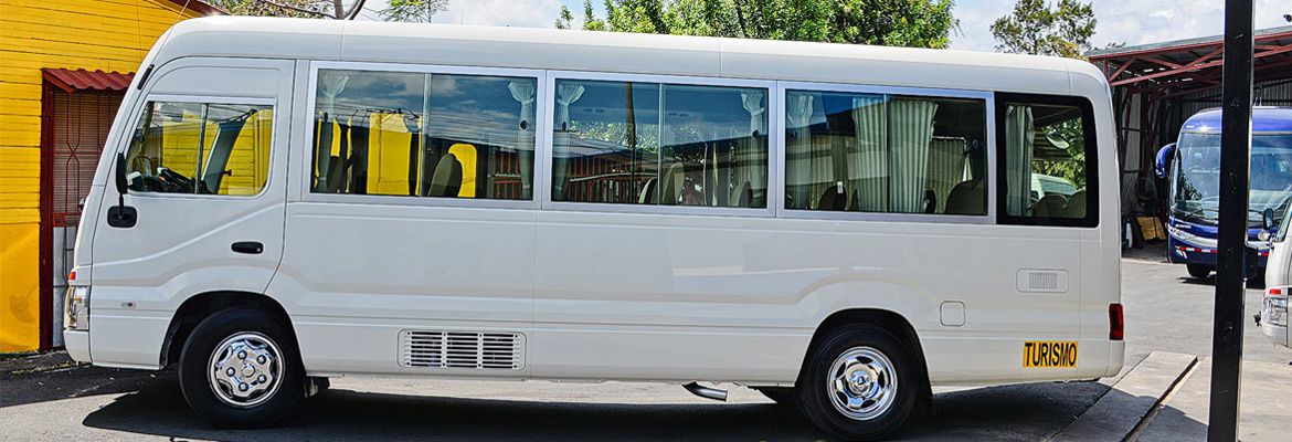 20 passenger coaster van lateral view leading image