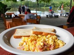 scramble eggs with ham and toast at perla del sur restaurant