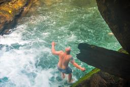 guy jumping off Portalon waterfall tour manuel antonio