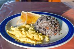 gallo pinto with eggs and bread restaurante carolina