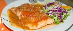 seabass on tomatoe sauce with salad restaurante carolina