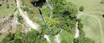 Me, hanging at the bottom of Central America's largest bungee jump on April 17, 2013. The bungee jump at Extremos drops guests 470 feet into the valley below.