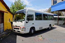 20 passenger coaster van lateral view with perspective