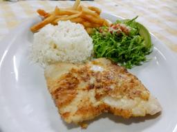 fish filet with salad rice and french fries at perla del sur restaurant 3