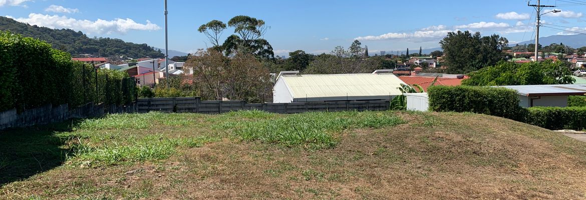 residential lot inside a gated community in curridabat view 028