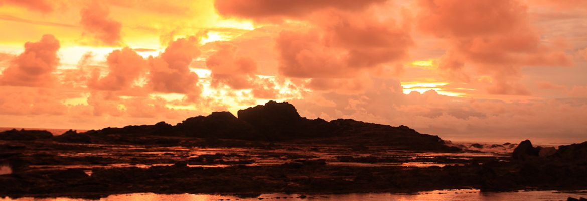 The sunset off the coast of Dominicalito outside Costa Paraiso Hotel on August 14, 2013