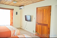 Premium Room Bedroom Tv Ac Unit And Door Los Lagos Resort
 - Costa Rica