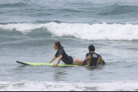 instructor giving guidance samara surf school 
 - Costa Rica