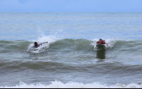        dominicalito waverider paddling 
  - Costa Rica