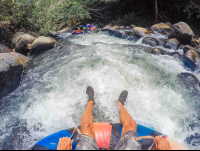 White Water And People Floating In Front Rio Negro Tubing Rincon De La Vieja
 - Costa Rica