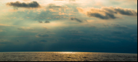 Sun Rays Reflected On On The Horizon Marlin Del Ray Catamaran
 - Costa Rica