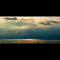        sun rays reflected on on the horizon marlin del ray catamaran
  - Costa Rica