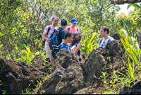 group of tourist taking pictures of the lava molten rocks at  hiking trail
 - Costa Rica