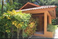        Ritmo Tropical Hotel Bungalow Facade
  - Costa Rica