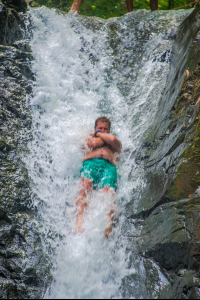Man Sliding On Uvita Waterfall Waterfall Tour Manuel Antonio
 - Costa Rica