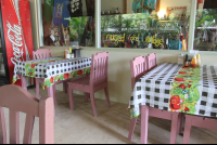 pink chairs checker tablecloths rosis soda 
 - Costa Rica