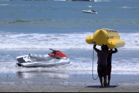        banana boat going out 
  - Costa Rica