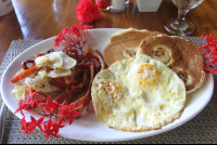 costa coral breakfast pancakes bacon eggs 
 - Costa Rica