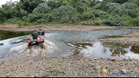 atv nosara tour crossing river confluence
 - Costa Rica