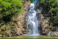        Montezuma Waterfall Front View In Wet Season
  - Costa Rica