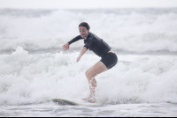 Lady Surfer On The White Water
 - Costa Rica