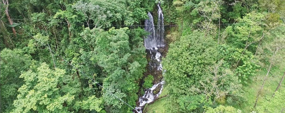 las gemelas double cascade waterfall view from zipline cable
 - Costa Rica