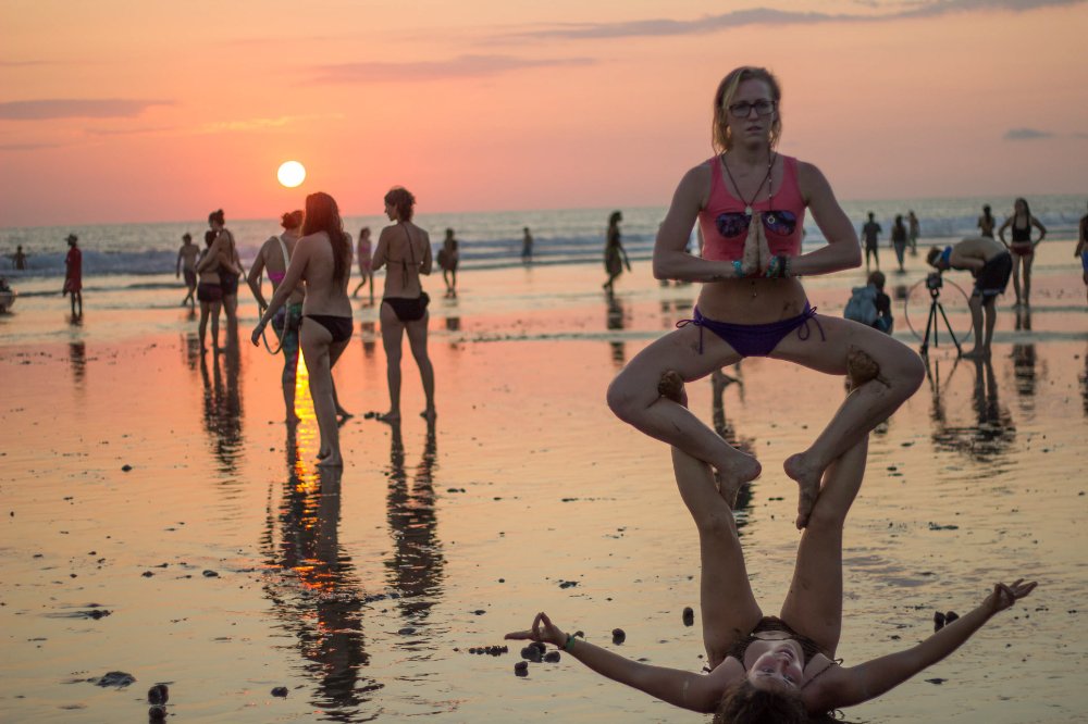 acro yoga on the beach envision festival costa rica
 - Costa Rica