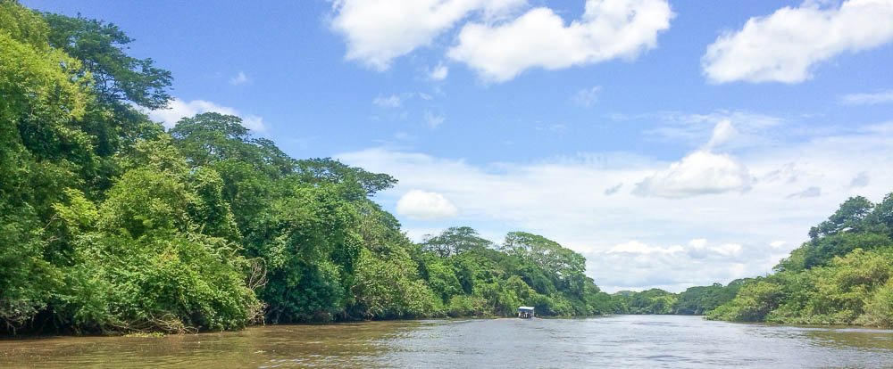 blue skies at tempisque river 
 - Costa Rica