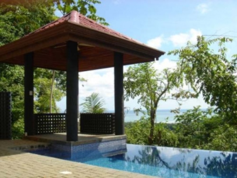        peaceful dominical pool ocean
  - Costa Rica
