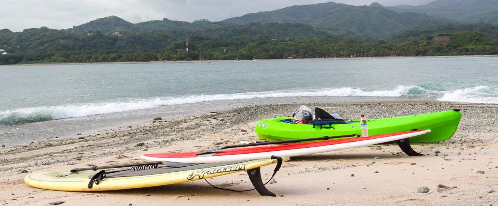        parked kayaks sup chora island
  - Costa Rica
