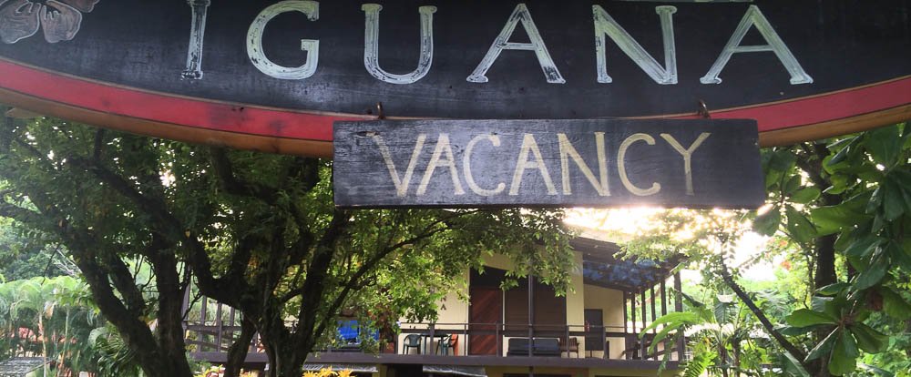 entrance sign gilded iguana
 - Costa Rica